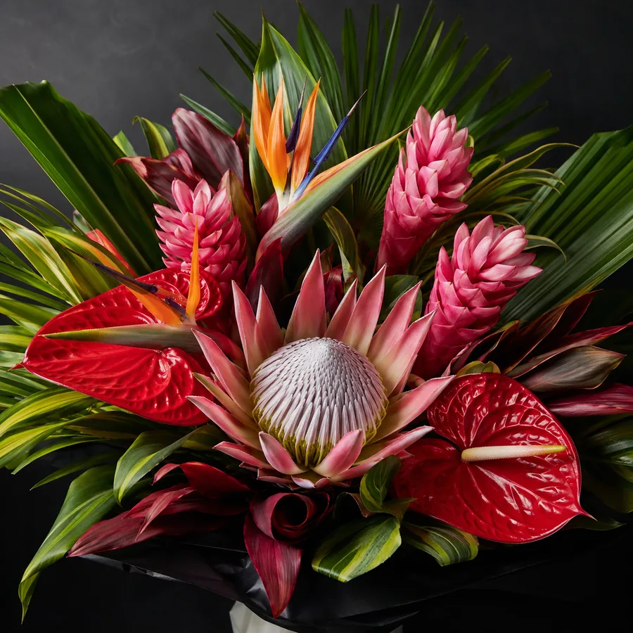 Statement bouquet of protea, pink ginger, anthuriums and birds of paradise